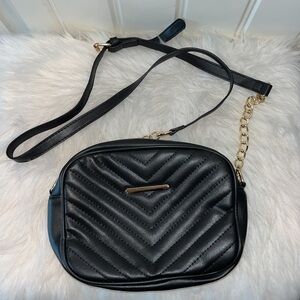 FAUX leather Designer inspired classic Black quilted purse
Never worn